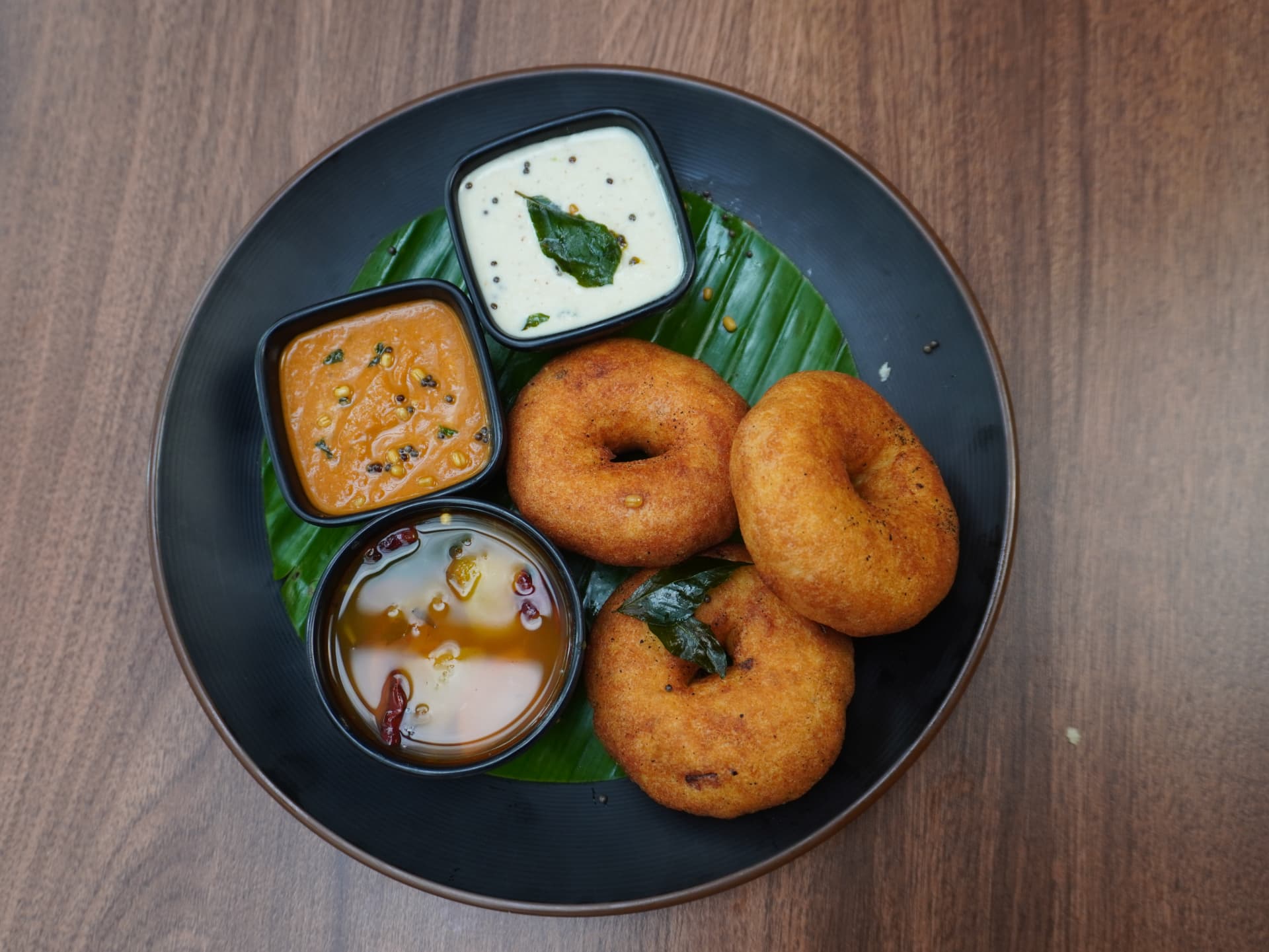 Medu vada platter with sambar and two chutneys