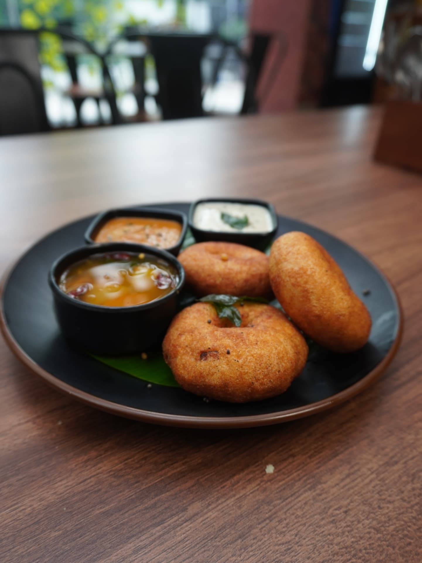 Golden medu vada with sambar and coconut chutney